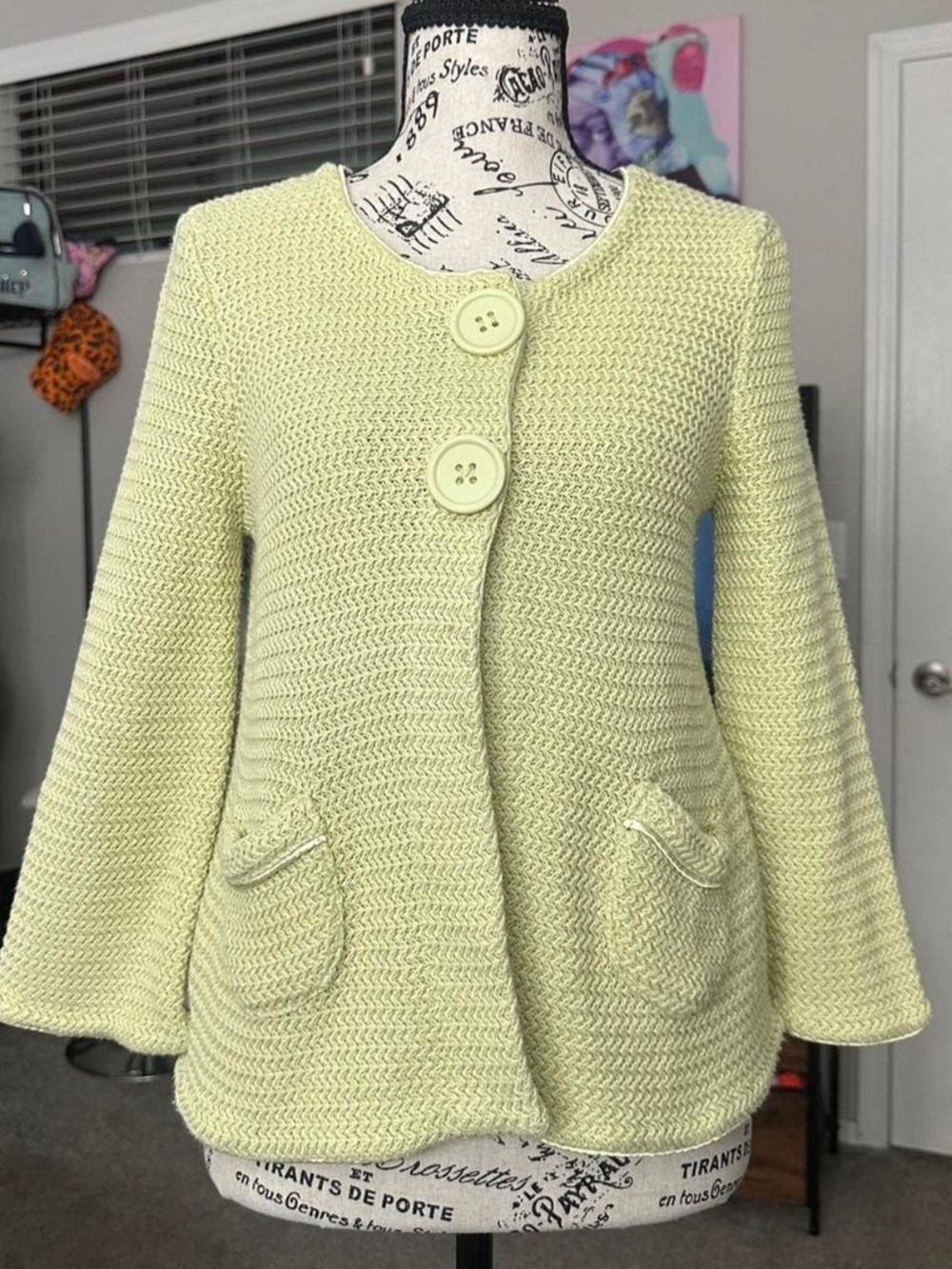 adorable light green button up cardigan with bell sleeves